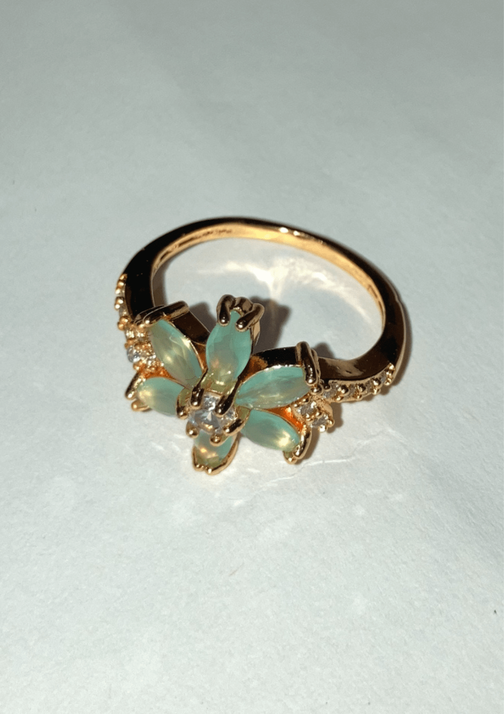 Golden Ring with a Green Stone