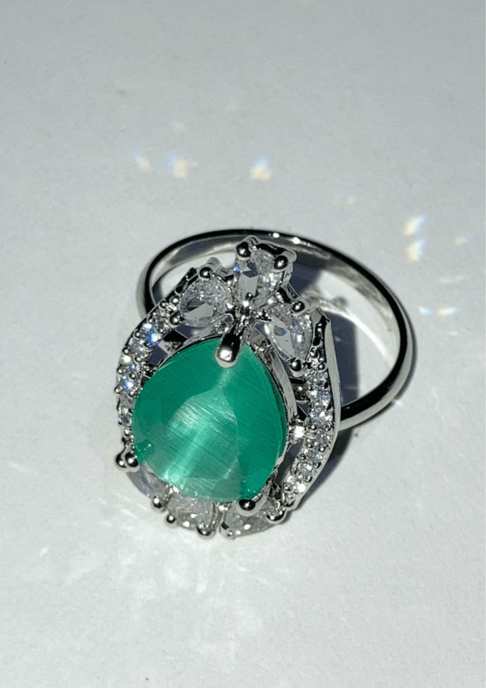 Silver ring with aqua green stone